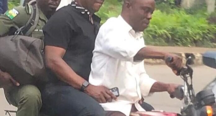 *Former Ekiti State Governor Ayo Fayose on a commercial motorcycle.