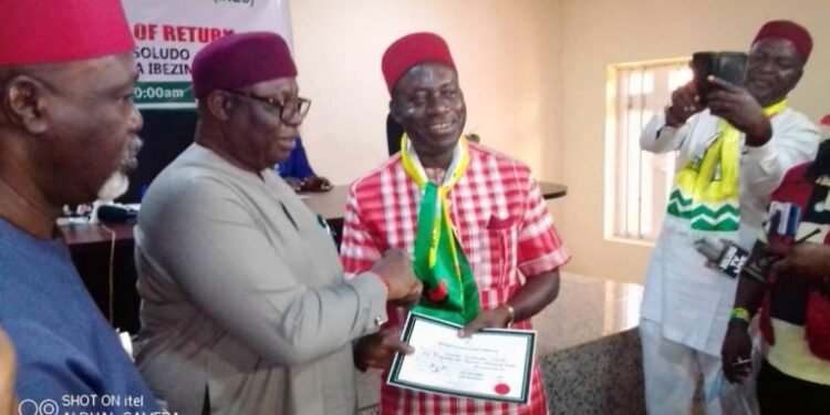 •Prof. Chukwuma Soludo receiving his Certificate of Return on Friday in Awka from Mr Festus Okoye.  [NAN-PHOTO]
