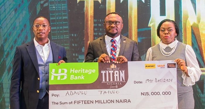 •R-L: Ozena Utulu, Ag. Group Head, Corporate Communications, Heritage Bank; Winner of The Next Titan Season-8, Adausu Taiwo and Mide Akinlaja, Executive Producer of The Next Titan, during the presentation of N15million prize at the grand finale of The Next Titan Entrepreneurial Reality TV show Season-8, headline sponsored by Heritage Bank Plc, held in Lagos recently. 