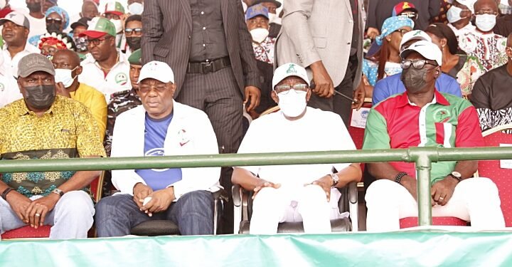•Delta Governor, Senator Dr. Ifeanyi Okowa (2nd right); one of his predecessors, Chief James Ibori (left); Deputy Governor of Delta, Barrister Kingsley Otuaro (2nd left) and State PDP Chairman, Barrister Kingsley Esiso, at the Delta PDP Mega Rally, held in Asaba on Saturday. PIX: JIBUNOR SAMUEL. 