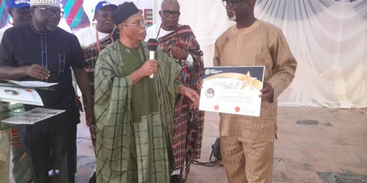 •AVM Anthony Okpere handing the certificate of recognition to one of the honorees