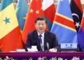 •President Xi Jinping of China and African countries' map as backdrop