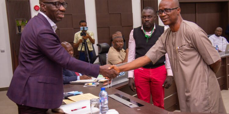 •Edo State Governor, Mr. Godwin Obaseki (left), with Commissioner for Science and Technology, Dr. Bartholomew Brai, after the swearing of Brai as commissioner, at the Government House, Benin City, on Thursday, March 24th, 2022.