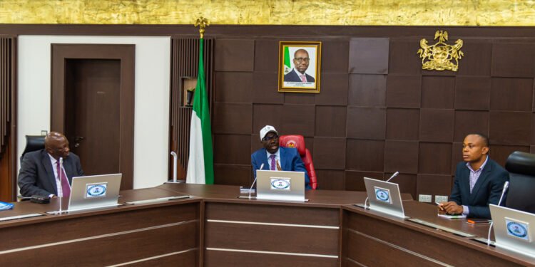 ••L-R: Secretary to the State Government, Osarodion Ogie Esq.; Edo State Governor, Mr. Godwin Obaseki, and Technology Transformation Lead, Greenfield Consultancy and Allied Services, Ugonna Joshua, during the presentation of the template of the pilot phase of the Edo Identification Scheme, at the Government House, Benin City, on Monday, April 25, 2022. 