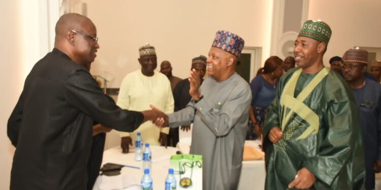 •Prof Babagana Zulum (r) and Senator Shettima (m) at the screening centre