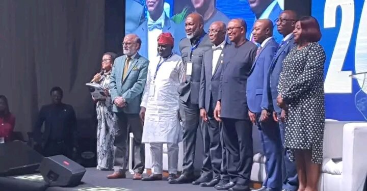 *Mr. Peter Obi (6th from left) and other members of the association during the conference