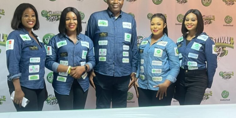 •Officials at the Glo's event
