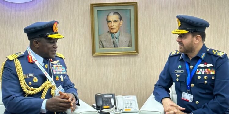 •Chief of the Nigerian Air Staff, Air Marshal Isiaka Amao (l) with a Pakistani military official at the Pakistan Aeronautical Complex