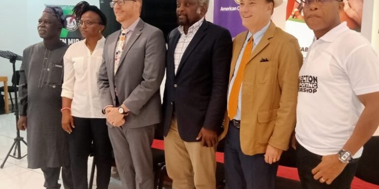 •U.S. Consul-General, Will Stevens in the middle with participants at the workshop