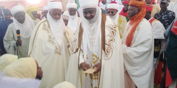 •The Sultan of Sokoto, Sa'ad Abubakar lll (l), the Emir of Kano, Aminu Ado-Bayero (r) and others at the event