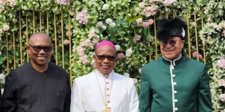 ••Archbishop Valerian Okeke, flanked by Mr Peter Obi (right) and Prof Pat Utomi.