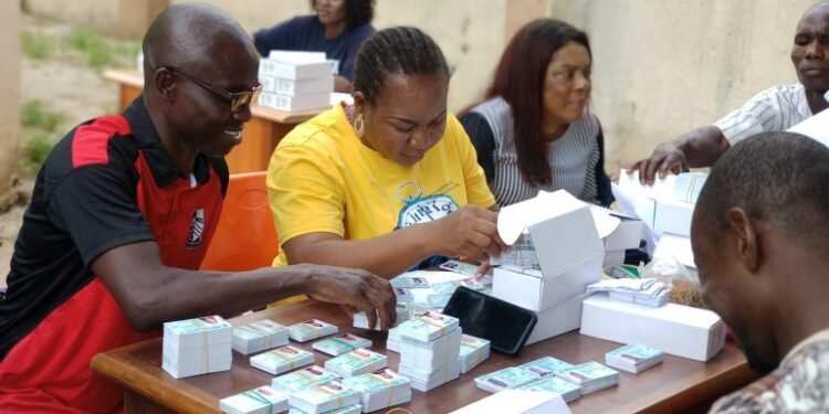 •INEC officials sorting the cards