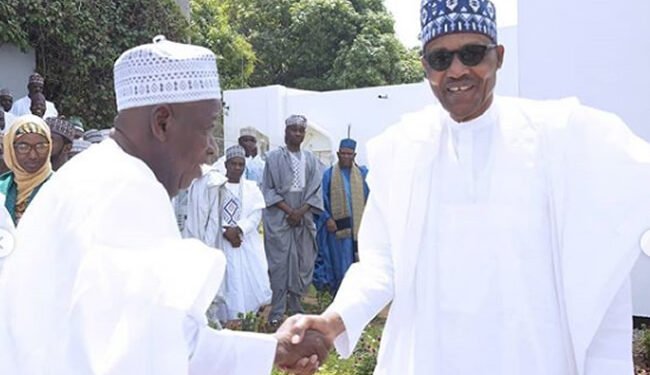*President Muhammadu Buhari (r) being welcomed to Kano by Governor Abdullahi Ganduja (l)...January 30, 2023