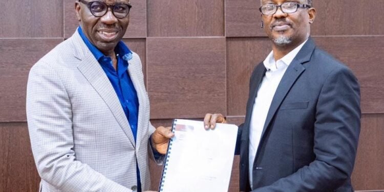 •Edo State Governor, Mr. Godwin Obaseki (left), and representative of Geniserve Limited, Mr. Tunde Famoroti, after the formal signing of the documents for partnership, at the Government House in Benin City.