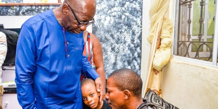 •Edo State Governor, Mr. Godwin Obaseki (left), consoling the husband of late Mrs. Elizabeth Owie, Mr. Osadebamwen Owie (right), and other family members, at their residence along Ogheghe-axis of Sapele Road, Benin City, on Monday, February 27, 2023.