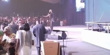 Abuja Pastor Brings AK-47 To Altar (Photos)