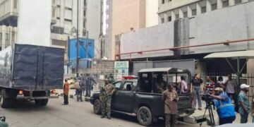 PHOTOS | Heavy Security at CBN Lagos Office as INEC Begins Distribution of Materials