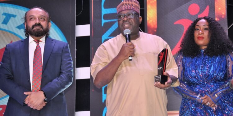 *Mr Zakari Usman,
Globacom's head of enterprise business, displaying the award