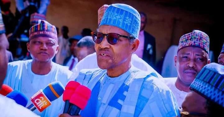 *President Muhammadu Buhari addresses journalists after casting his vote during the March 18 governorship and state house of assembly elections in Katsina. 
Credit: Garba Shehu