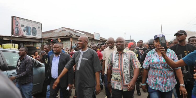 *Former governor Rotimi Amaechi (front) leading an APC campaign for Tonye Cole... in Port Harcourt