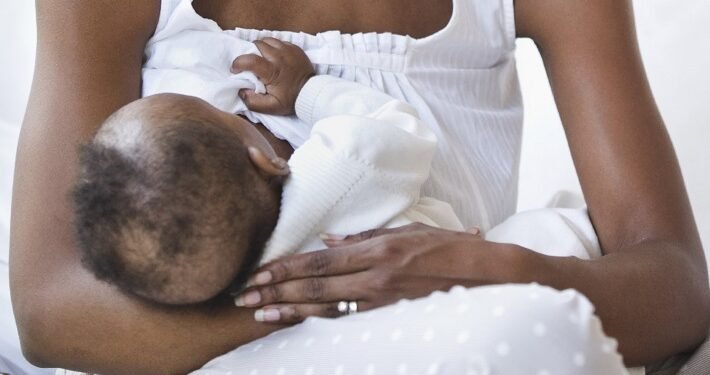 *A breastfeeding mother used to illustrate the story [Photo credit: The Sun Nigeria]
