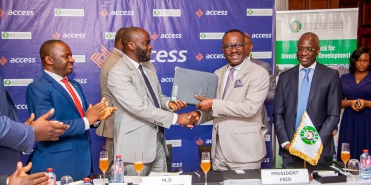 **Officials of Access Bank Plc and EBID...during the event