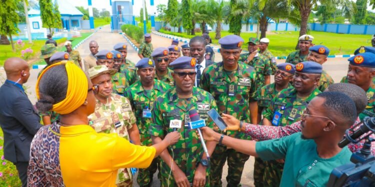 * Chief of the Air Staff, Air Vice-Marshal Hasan Abubakar, answering questions from journalists as part of his tour of the Nigerian Air Force Base in Makurdi, Benue State.