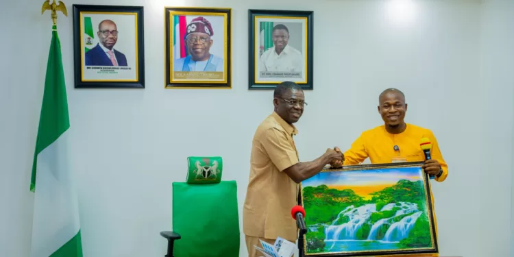 •Philip Shaibu and Steppy Atsemonokhai, NAESS National President at the Government House, Benin City on Monday.