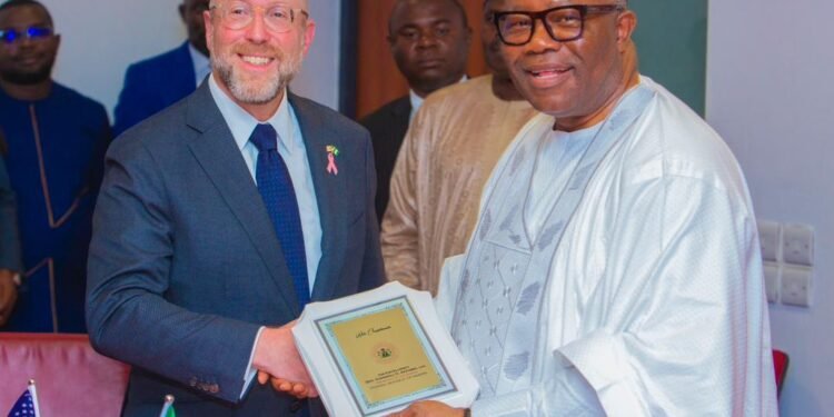 *Nigeria Senate President, Godswill Akpabio (r) and Charge D'Affaires US Embassy in Nigeria, David Greene