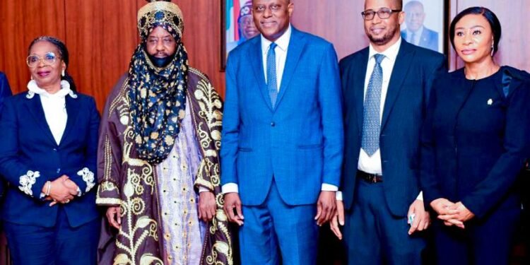 *CBN governor, Olayemi Cardoso (m) with the 14th Emir of Kano and  Khalifa of the Tijaniyyah Sufi order of Nigeria and the neighbouring countries, Muhammadu Sanusi II (2nd left) during a visit to the former at the CBN, Abuja