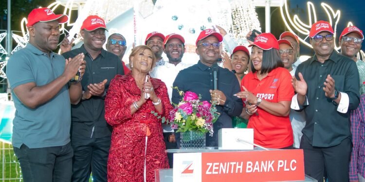 *The Group Managing Director/CEO of Zenith Bank Plc, Dr. Ebenezer Onyeagwu (4th Left) flanked by the wife of the Founder and Chairman of Zenith Bank Plc, Mrs. Kay Ovia (3rd Left); Executive Director, Mr. Henry Oroh (1st Left); Executive Director, Dr. Temitope Fasoranti (2nd Left); Executive Director, Mrs Adobi Nwapa (2nd Right); and Executive Director, Mr. Akin Ogunranti (1st Right) at the 2023 Zenith Bank Christmas Light-Up of Ajose Adeogun Street, Victoria Island, Lagos at the weekend.