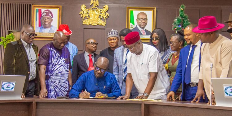 *L-R: Secretary to the Edo State Government, Osarodion Ogie Esq.; Edo State Governor, Mr. Godwin Obaseki; Speaker of the Edo State House of Assembly, Hon Blessing Agbebaku, and Clerk of the State Assembly, Clerk of the Edo State House of Assembly, Alh. Audu Yahaya Omogbai, during the signing of the 2024 budget into law by the governor, at the Government House in Benin City, on Friday, December 22, 2023.