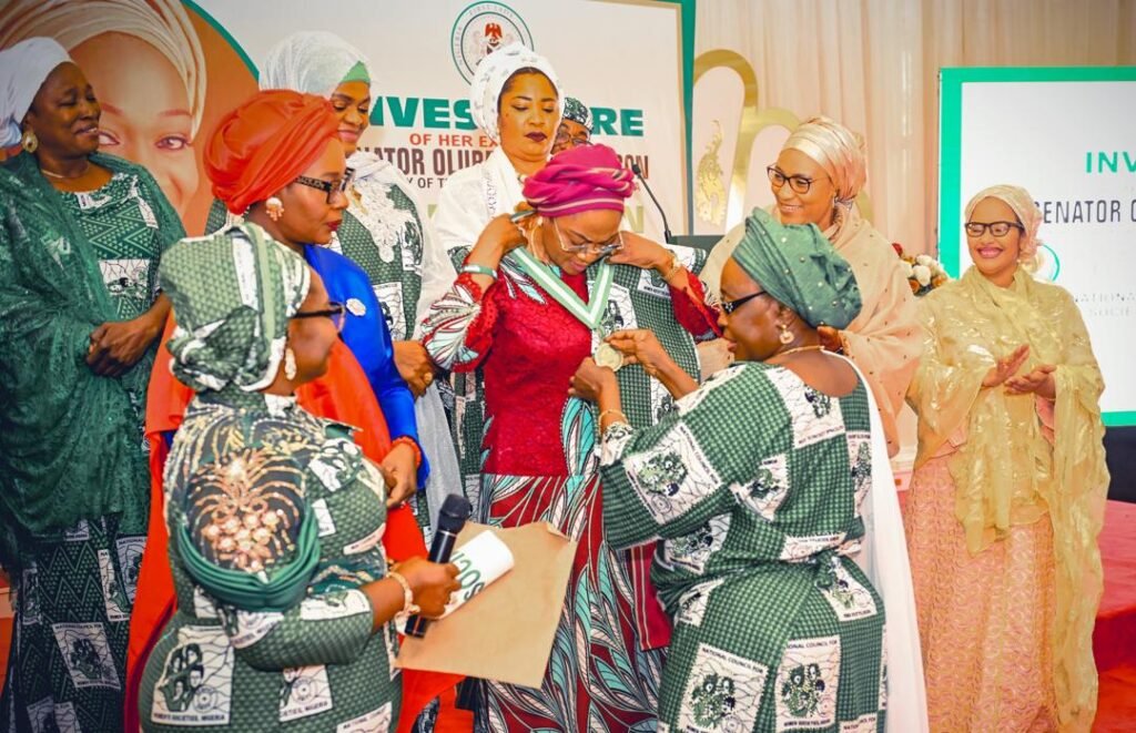 *First Lady Oluremi Tinubu being decorated by the NCWS officials