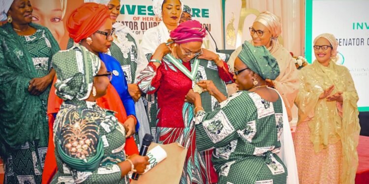 *First Lady Oluremi Tinubu being decorated by the NCWS officials