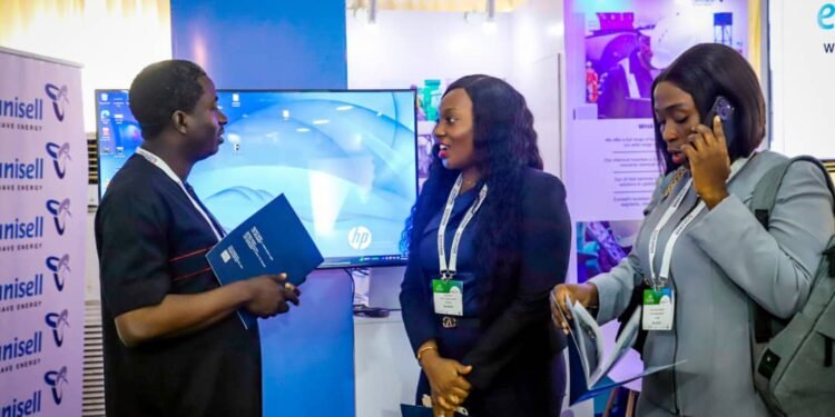 *Eunisell’s AGM Sales & Operations, Marie Sibe (m), engaging with industry professionals at the just concluded 2023 Practical Nigerian Content Conference.