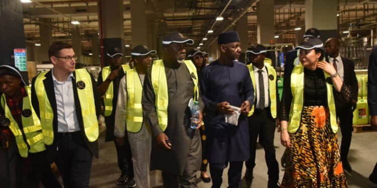 *Minister of Industry, Trade, and Investment, Dr. Doris Uzoka-Anite, and officials as she begins tours of  leading manufacturing companies in Nigeria.