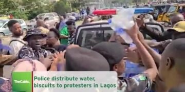 Police Distribute Water, Biscuits to Protesters in Lagos | METROWATCH