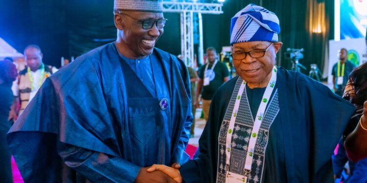 *GCEO NNPC Ltd., Mr. Mele Kyari in a handshake with the Chairman of the NNPC Limited Board, Chief Pius Akinyelure during the opening ceremony of the Nigeria International Energy Summit (NIES) 2024, held at the International Conference Centre in Abuja, on Monday.