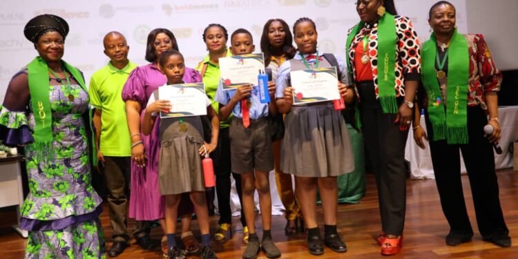 *L-R Dr kemi Akiyode-Adebayo (BOT WINBAFRICA) Blissful Oke, Nyhero Pela, Kyala Michaels of Steady Steps School Lekki Lagos, winners of WINBAFRICA Young Nation Builders Trophy (WYNBT) at WINBAFRICA schools debate 2024, Dr Bukola Bello Jaiyesimi (Founder WINBAFRICA), Barnabas Wasiu (Time Keeper), Mrs. Ronke Adeshoga, Ummi Bodede (Chairperson, Panel of Judges) Barr. Chigozie Chinwe, during the 10th anniversary of the African Women Foundation for Nation Building (WINBAFRICA) held at the Alliance Francaise, Mike Adenuga Centre, Ikoyi, Lagos