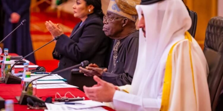 *President Bola Tinubu (m) speaking at the Nigeria-Qatar Business Forum in Doha on Sunday, March 3, 2024