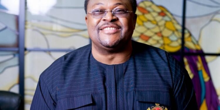 *Dr. Mike Adenuga