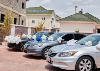 PHOTOS | Excitement as Spotlite Nation Boss Moses Bliss Gifts 3 Signees Brand New Cars | METROWATCH