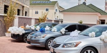 PHOTOS | Excitement as Spotlite Nation Boss Moses Bliss Gifts 3 Signees Brand New Cars | METROWATCH