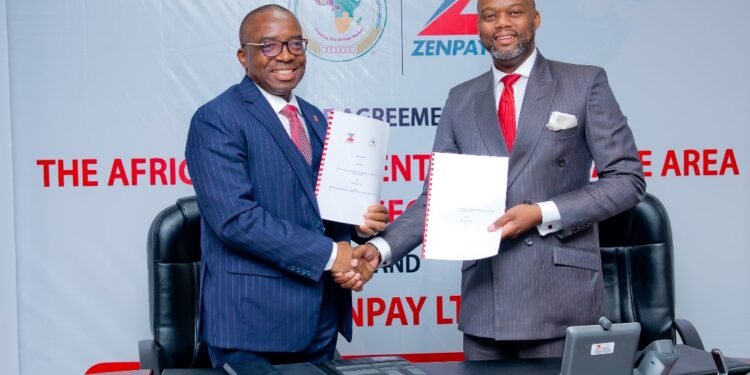 *L-R: Chairman of Zenpay Limited, Dr. Ebenezer Onyeagwu and the Secretary-General of the African Continental Free Trade Area (AfCFTA) Secretariat, His Excellency Wamkele Mene, during the signing of an agreement for the development and deployment of the SMARTAfCFTA Portal to facilitate trade within the African continent, at Zenith Bank Headquarters, Ajose Adeogun Street, Victoria Island, Lagos on Friday.