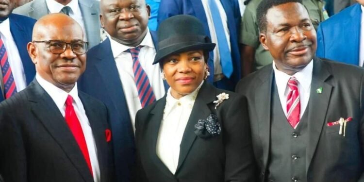 *Justice Eberechukwu Wike (m) flanked her husband, Nyesom (l) and Chief Ozekhome SAN (r)