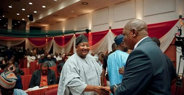 *Former GMD of NNPC, Dr Andy Yakubu (l) in a handshake a dignitary at the Senate's Public Hearings on the proposed Federal University of Applied Sciences Manchok, Kaduna State.