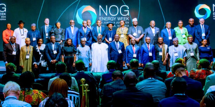 *GCEO, NNPC Ltd, Mallam Mele Kyari (standing 7th from left) in a group photograph with participants at the on-going Nigeria Oil & Gas (NOG) 2024 Energy Week Conference & Exhibition in Abuja.