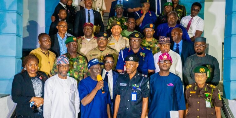 *Edo State Governor, Senator Monday Okpebholo (holding the microphone - front row) and members of the state security council... Nov 18, 2024.