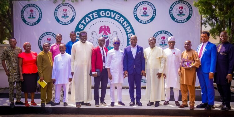 Edo State Governor, Senator Monday Okpebholo (7th right), his deputy, Rt. Hon. Dennis Idahosa (6th right) and the visitors...in Government House, Benin City, Dec 16, 2024