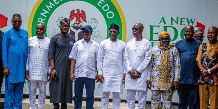 *Gov Monday Okpebholo (m) flanked by members of IPMAN on Friday, in Benin City